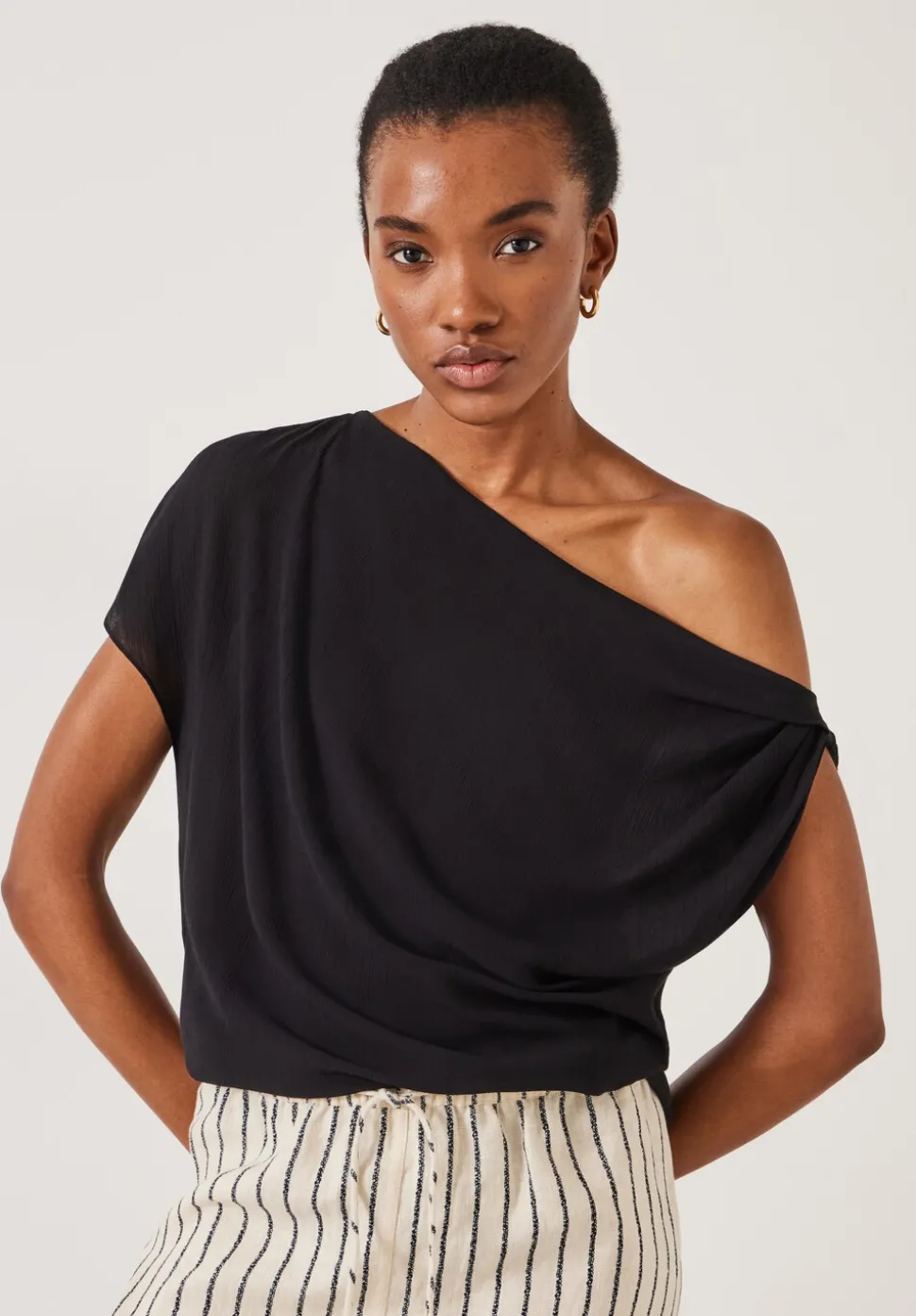 Grace Asymmetric Top
